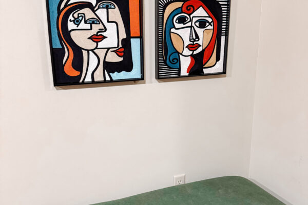 Amenities include dining table, chairs, fridge, stove, microwave Amenities include dining table, chairs, fridge, stove, microwave Contemporary artwork with green sofa on display